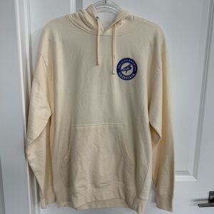 Pelican Brewing Cream Hoodie with Blue Emblem